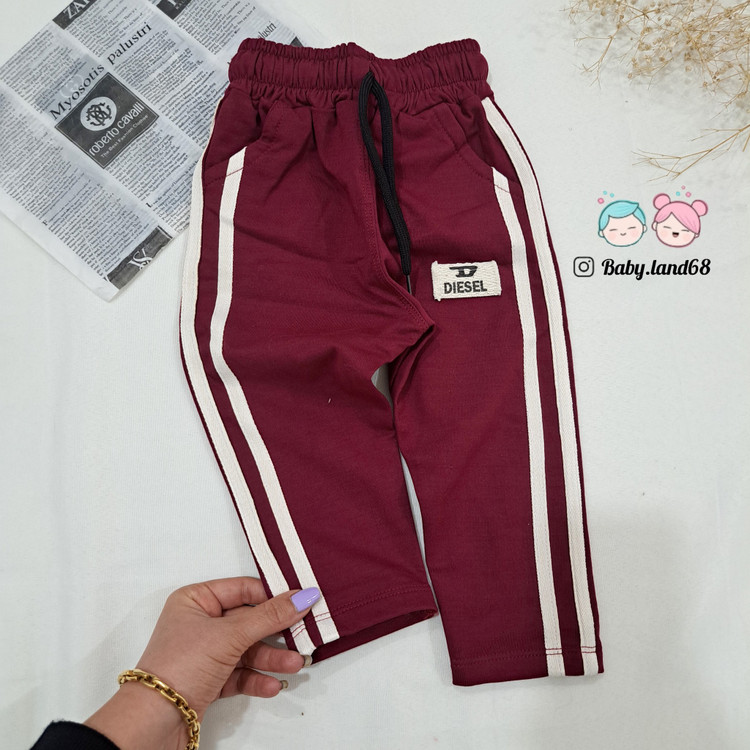 شلوارتک بچگانه نوار دوزی شده اسپرت مناسب پسر و دختر ۱ تا ۶ ساله رنگ زرشکی