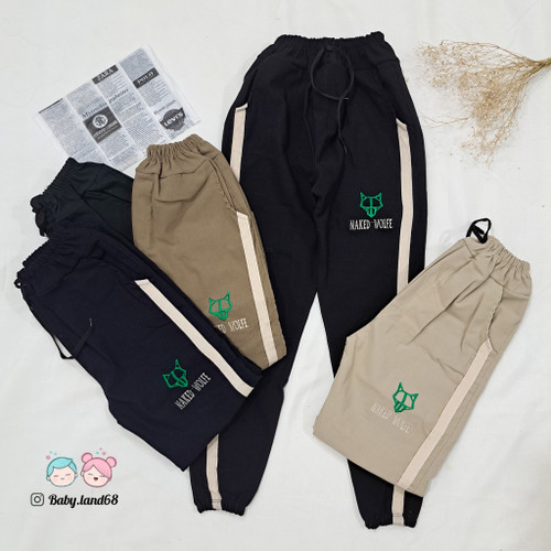 شلوار جاگر بچگانه اسپرت نوار دوزی سایز ۹۰ و ۹۵مناسب ۱۰ تا ۱۵ سال جنس کتان کشی کیفیت عالی دارای مچ کشی در پائین پا