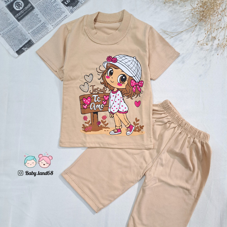 ست تیشرت و شلوارک دخترانه بچگانه ۶ ماه تا ۷ سال سایز ۳۵ تا ۵۰ جنس پنبه طرح دخترک کلاه به سر رنگ کرمی